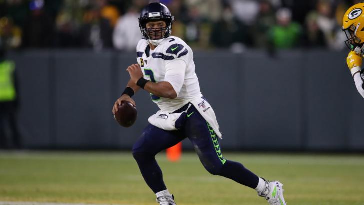 Russell Wilson runs the ball for Seattle Seahawks